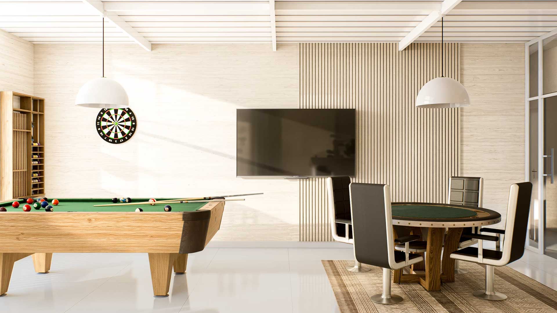 Sala de jogos com mesa de bilhar e área social